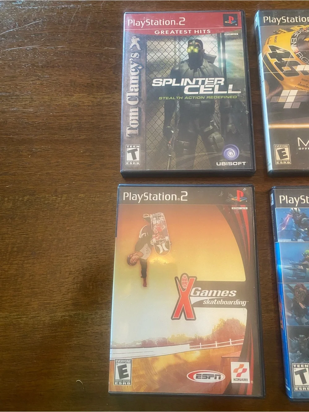 6 PS2 Jak II, Guitar Hero I & II, Splinter Cell, MotoGP 2, X Games Skateboarding